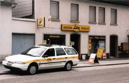 Firmenwagen vor Filiale Klner Strasse 24